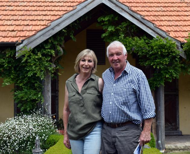 Tikana Wapiti Stud owners Donna Day and Dave Lawrence at their horse stables before their annual...