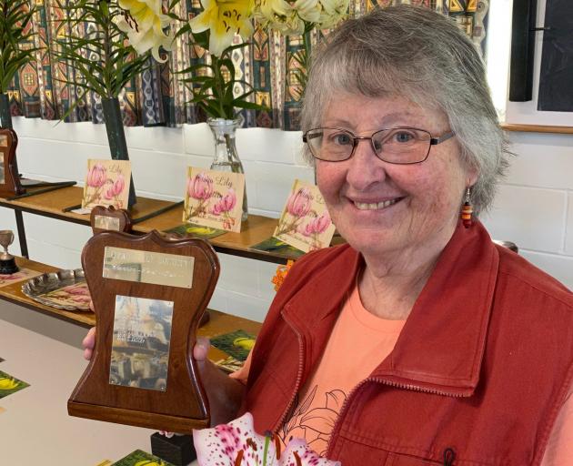 Keri Smith, who won two trophies and received the most points overall at the Otago Lily Society...
