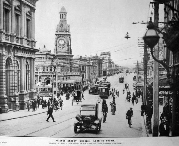 Pedestrians, cyclists, horse-drawn transport, trams and cars share Princes St in 1922. PHOTO:...