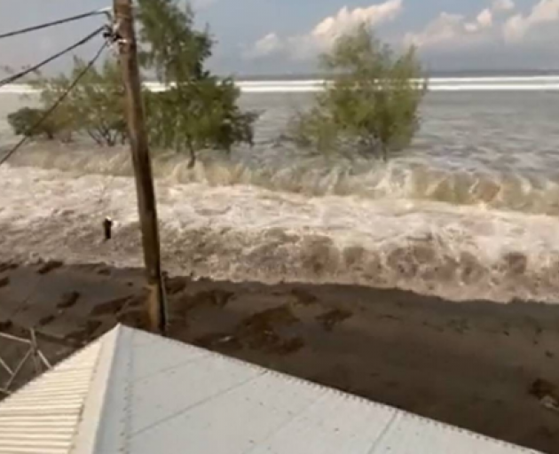 Footage posted on Twitter shows the waves coming ashore in Tonga. Photo: via Twitter
