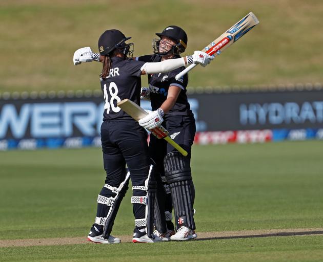 Melie and Jess Kerr celebrate the White Ferns’ win in the second one-day international against...