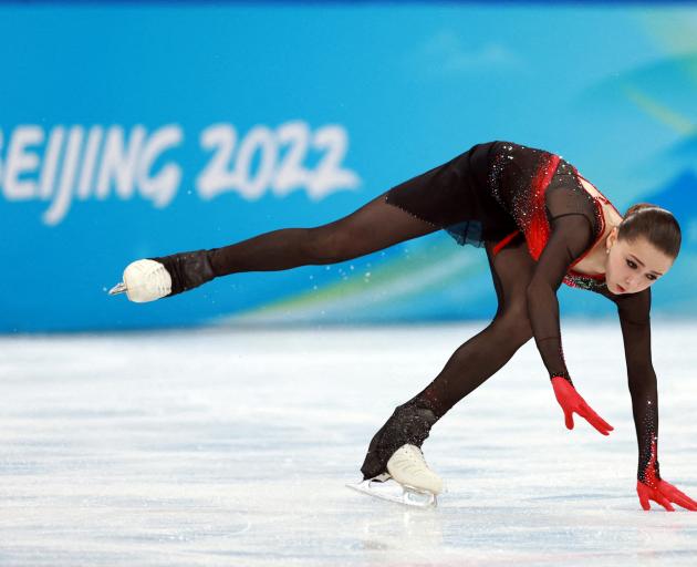 Kamila Valieva of the Russian Olympic Committee falls during her performance. Photo: Reuters