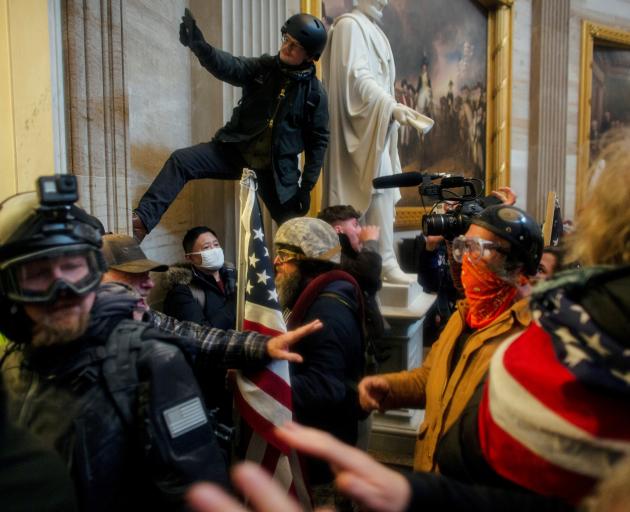 Pro-Trump protesters storm the Capitol Building on January 6. Photo: Reuters