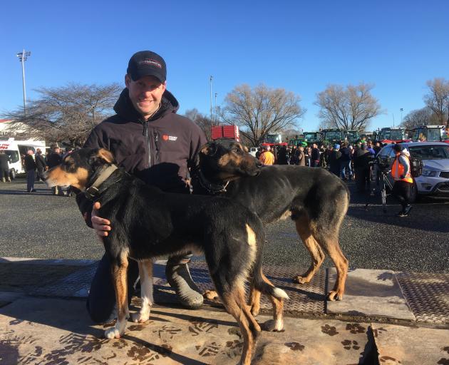 Gore protest coordinator  Logan Evans, of Otamita Valley, and his working dogs at the  A&P...