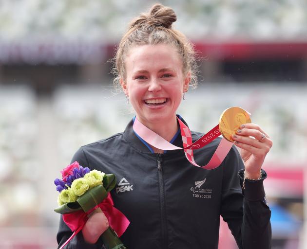 Dunedin athlete Anna Grimaldi shows off her gold medal after winning the women’s long jump T47 at...