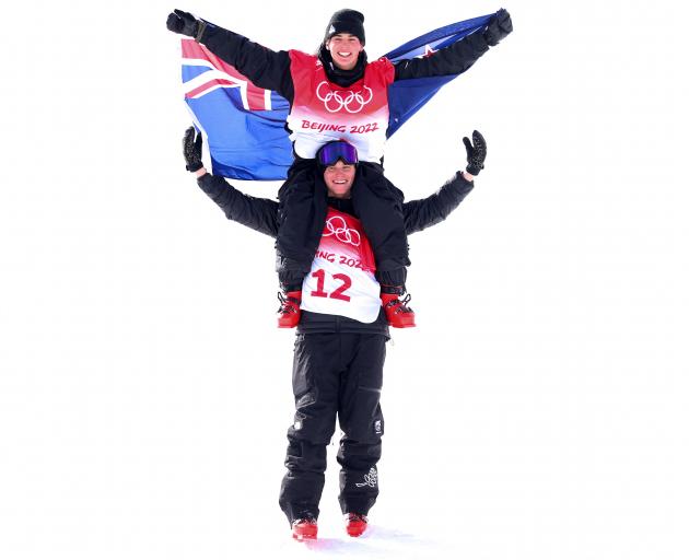 Nico, top, and Miguel Porteous celebrate the younger sibling's success in the halfpipe final....