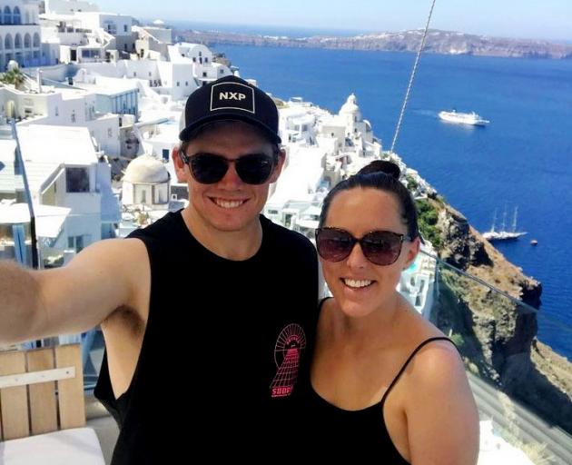 Tom Latham on the iconic Greek island, Santorini, with wife Nicole. Photo: Supplied