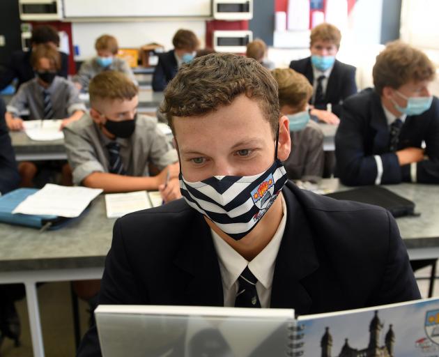 Back to school on the first day of class is Otago Boys’ High School year 13 pupil Luke Moffitt in...
