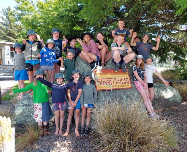 Pupils at Strath Taieri School celebrate winning the Mazda Foundation TREEmendous Education...