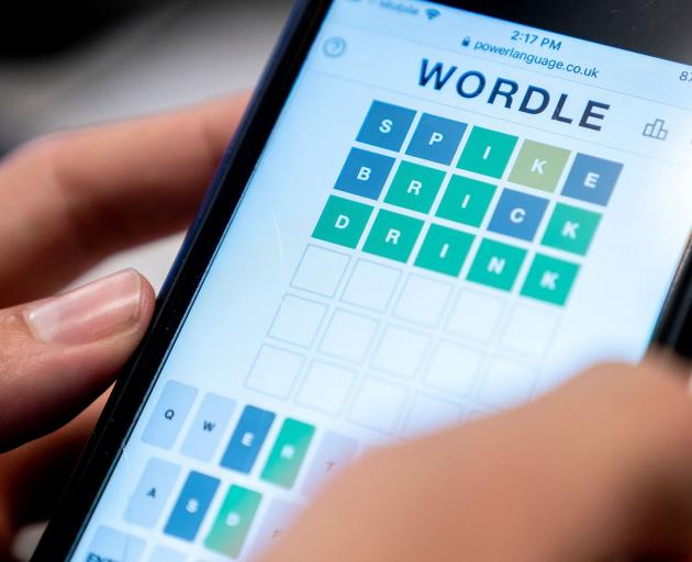 The word game "Wordle" on a mobile phone. PHOTO: GETTY IMAGES