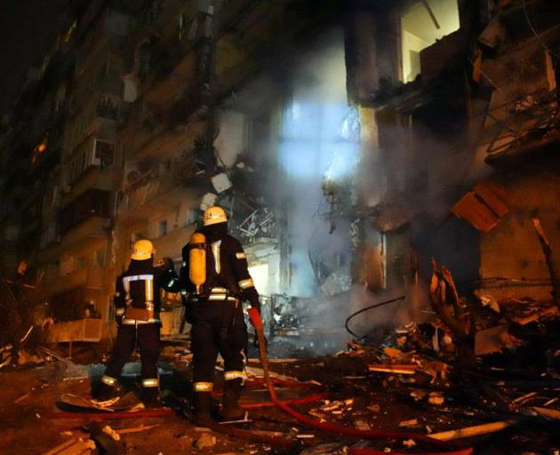 A photo distributed by Ukraine’s State Emergency Services Department shows a multistorey building...