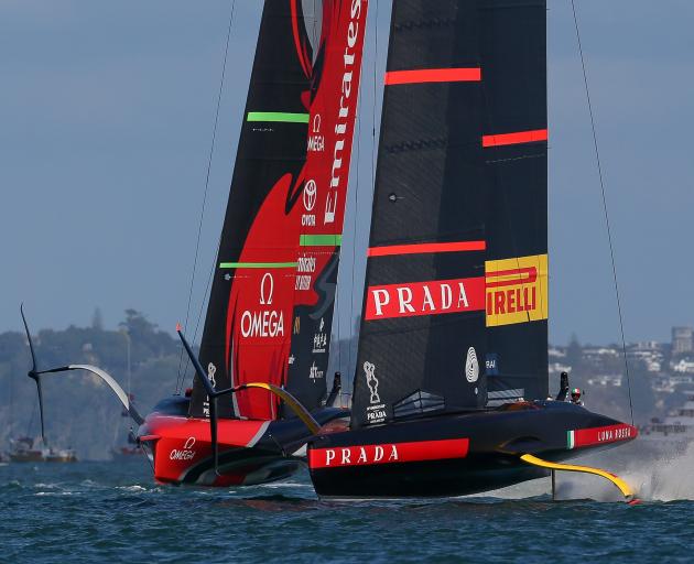 Team NZ (left) and Luna Rossa battle it out on Waitemata Harbour in last year's edition of the...