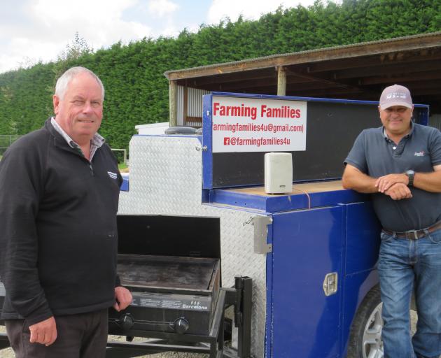 Bruce Taylor and Craig Wiggins with the Farming Families barbecue available for use by Mid...