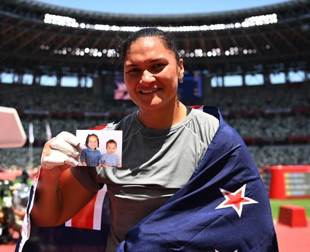 Dame Valerie with a photo of her children, daughter Kimoana and son Kepaleli. Photo: Reuters