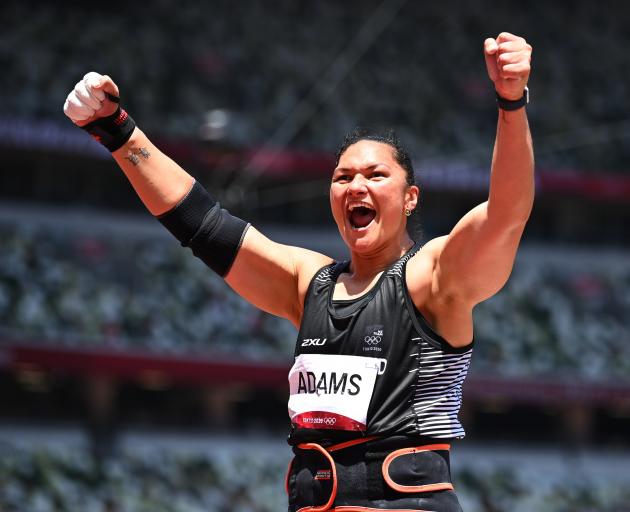 Dame Valerie Adams at the Tokyo Games, where she made history by becoming the first woman to win...