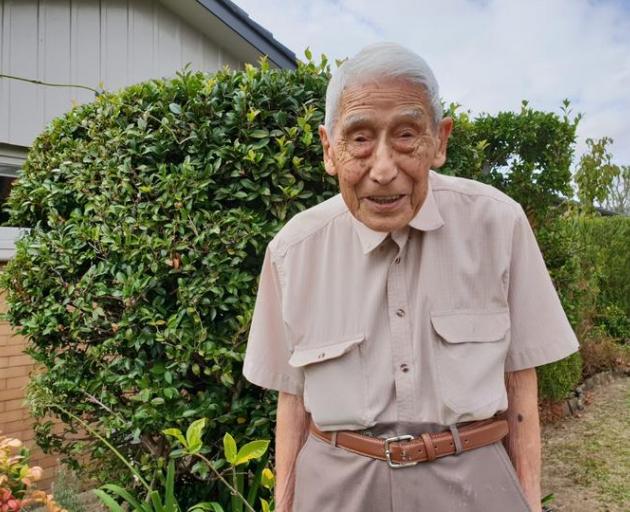 John Sato in his garden at home in March 2020. Photo: RNZ / Liu Chen John Sato in his garden at home in March 2020. Photo: RNZ / Liu Chen