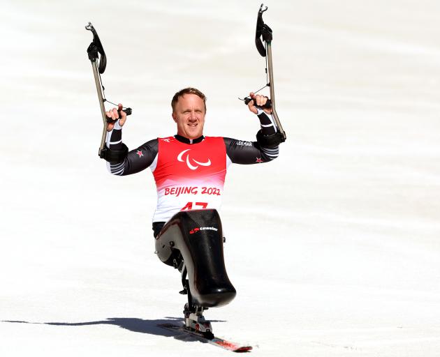 Corey Peters celebrates his gold medal winning run. Photo: Getty Images