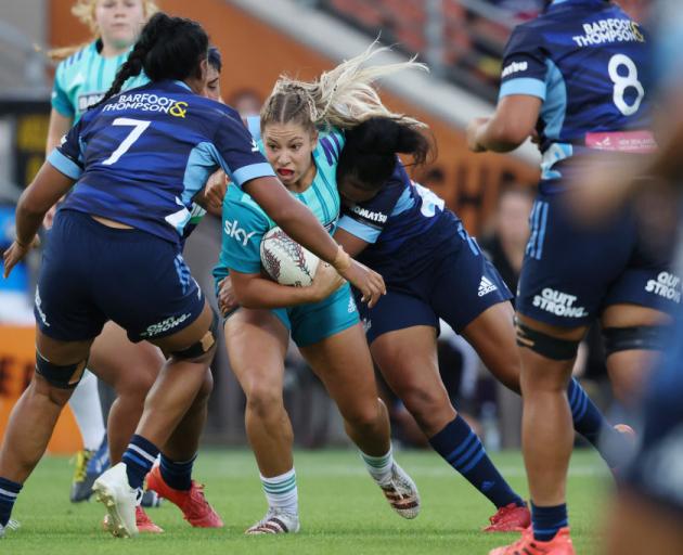 Amy du Plessis of Matatū looks for a way through the Blues defence during tonight's match. Photo: Getty Images