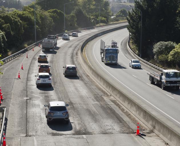 Traffic travels about 30kmh on the northbound lane of the Southern Motorway at Green Island,...