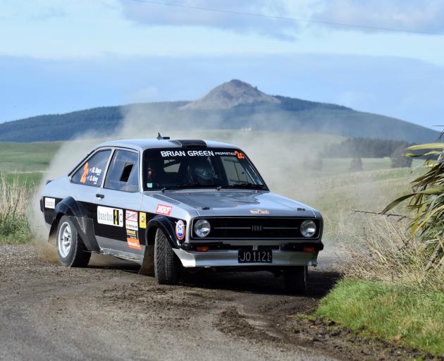 Classic Rally winner Regan Ross slides his Ford Escort into a corner on Sunday morning’s...