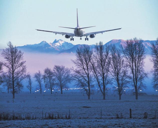 A compilation photo showing a jet landing where the proposed Tarras airport would be. GRAPHIC:...