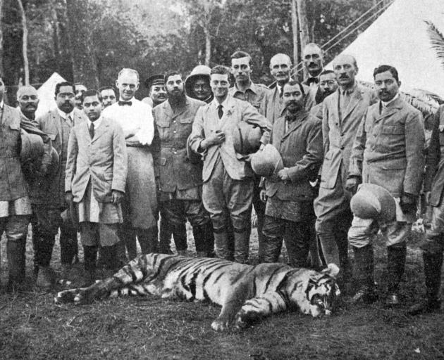 Edward, Prince of Wales’s first tiger kill in Nepal. The Prince (centre) is accompanied to his...