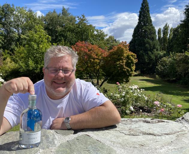 Broken Heart Spirits owner Joerg Henkenhaf, of Queenstown, with a bottle of the distillery’s...