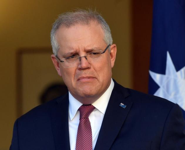 Scott Morrison insists total urgency is being applied to the Covid-19 vaccine rollout, despite...