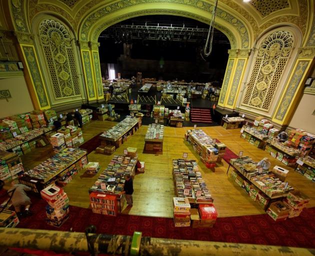 Volunteers work to prepare tens of thousands of quality books for sale in the Regent Red Setting...