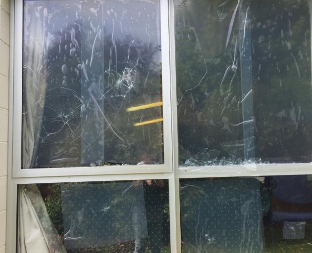 Damage to the windows in the Senior Citizens Hall, where Taieri Age Connect is based. PHOTO:...