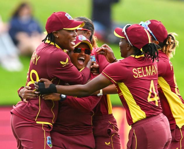 Anisa Mohammed of West Indies celebrates dismissing England's Sophie Ecclestone and winning the...