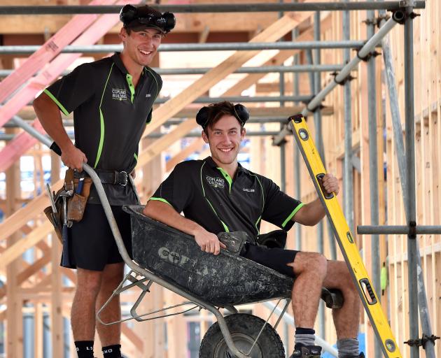 Twin Dunedin building apprentices Josh (left) and Callum Winders prepare for the upcoming New...