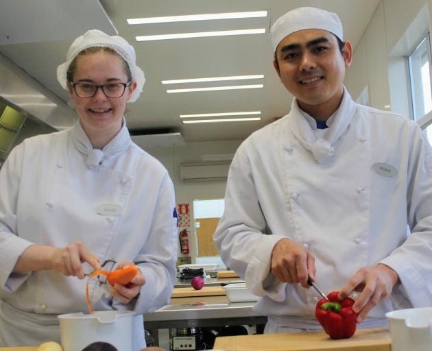 SIT students Chloe Bond and Howie Nguyan are nervous and excited to prepare a banquet for the...