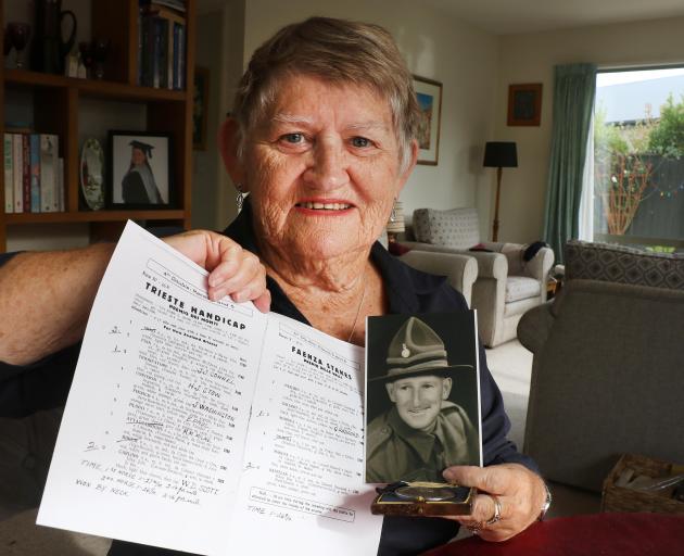 Anne Ny with her father Walter Scott’s WW2 memorabilia, including the Trieste Handicap race...