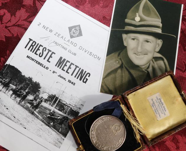 A photo of Anne Ny's father Walter Scott with the Trieste Handicap race programme and his medal....