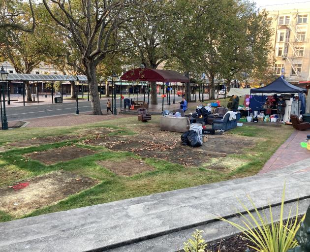 Protesters in the Octagon removed tents and structures this morning. Photo: Stephen Jaquiery