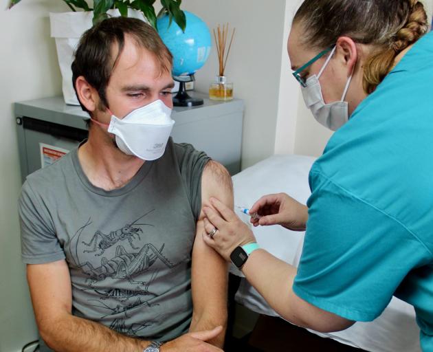 Aurora Health Centre nurse Stacey Ellis gives Dr Conal Boland-Bristow a flu vaccine at the South...