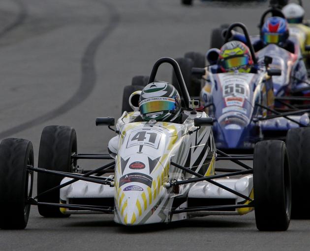 Alex Crosbie leads Bree Morris during the final round of the New Zealand Formula Ford series at...