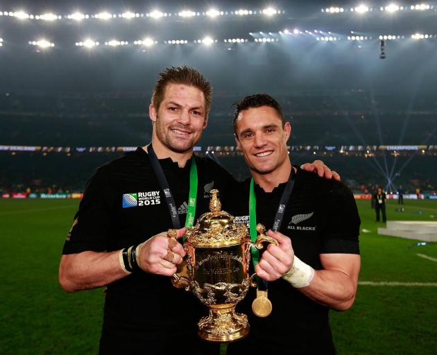 Richie McCaw and Dan Carter with the Webb Ellis Cup after winning the 2015 World Cup. Photo: Getty
