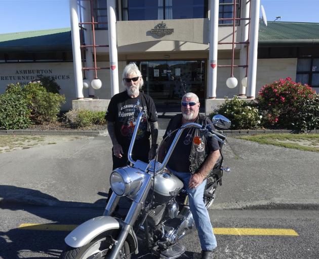 Originals Motorcycle Club president Gerald McKenzie (left) and member Humpty outside the...