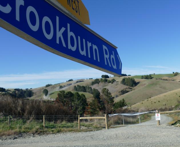 Waitahuna West farmer Dave Shaw has gated off a section of Crookburn Rd where it intersects with...
