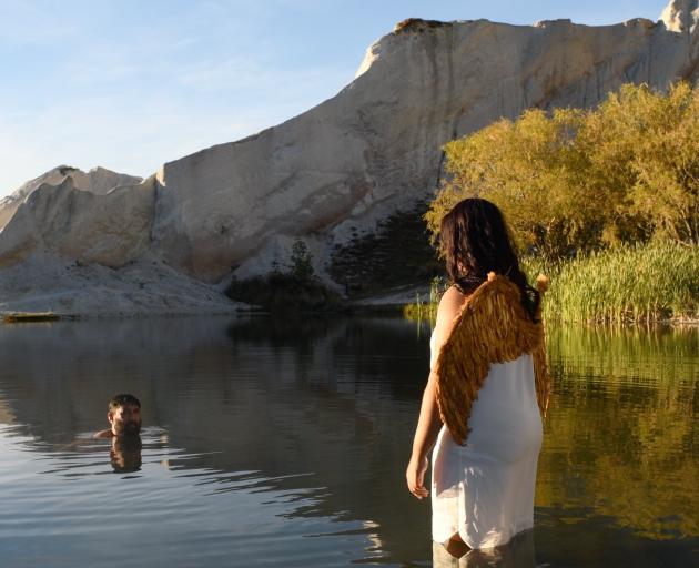 Christopher Ulutupu takes a swim at St Bathans, watched by his sister Fame Ulutupu in her angel...