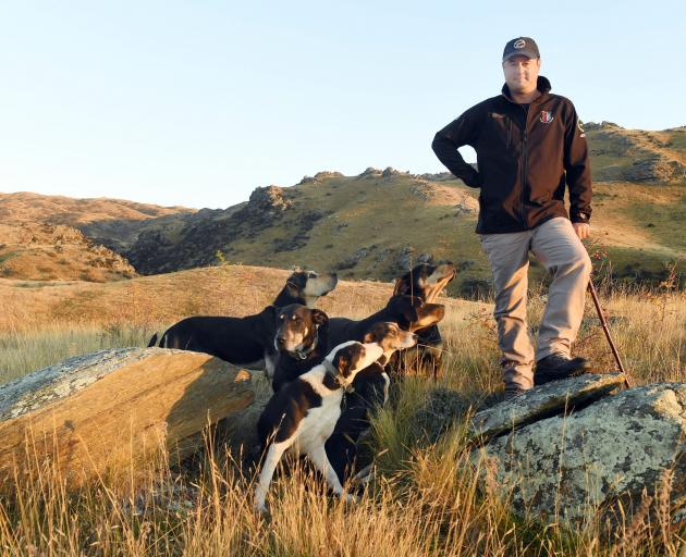 Leo Edginton with his six dogs that he qualified for this week’s South Island sheep dog trial...