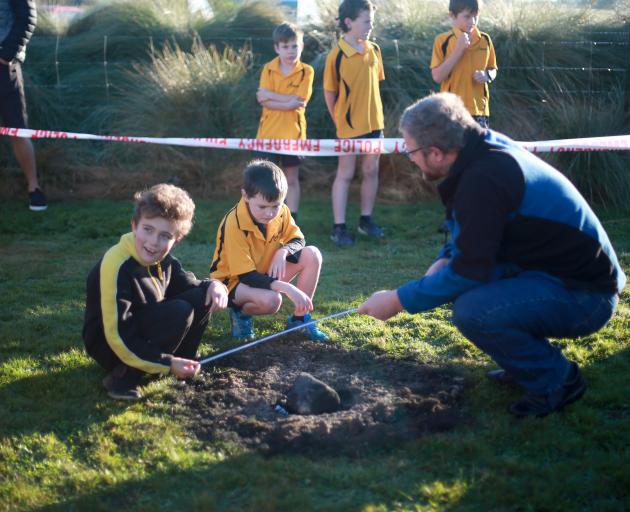 Ardgowan School pupils Kyden Fraser-Stewart (9, left) and Beau Arthur (7) chat about meteorites...