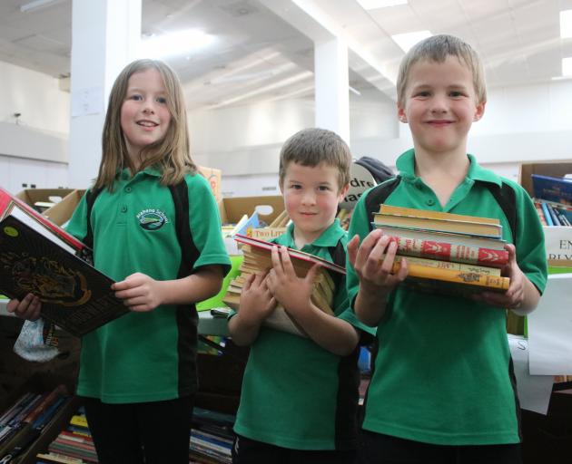 Looking for a bargain on the opening day of The Rotary Club of Oamaru’s Bookarama are (from left)...