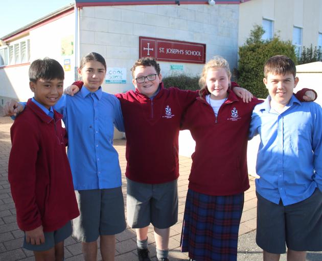 St Joseph’s School pupils putting together music for the production movie are (from left) King...