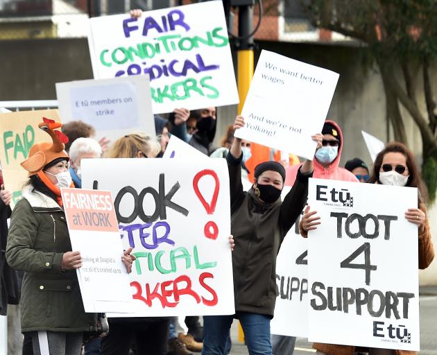Zeagold workers protest outside the company’s head office in Dunedin yesterday. PHOTO: PETER...