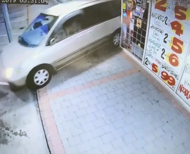 CCTV footage shows a vehicle being reversed into a store in Hamilton. Photo: Supplied via NZ Herald