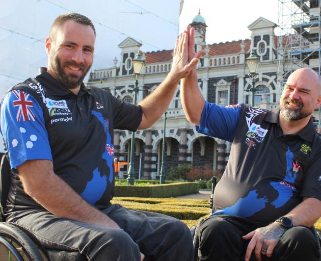 Rob Gillan (left) and Patrick Morrison high-five before their trip to Belgium. PHOTO: SIMON...