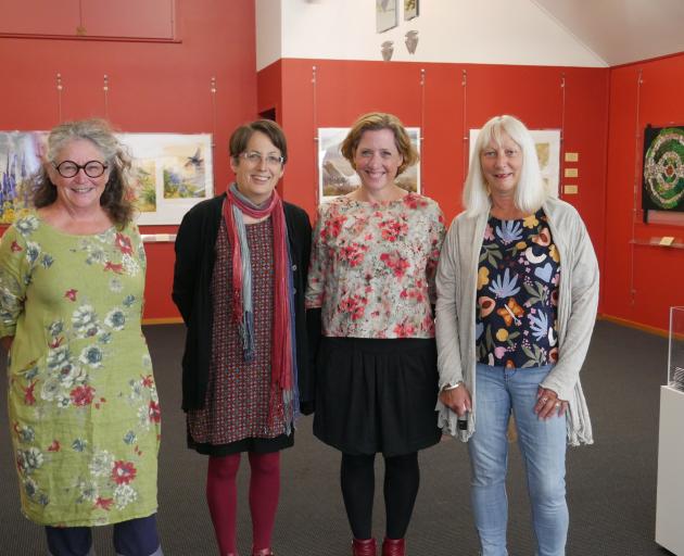"The Four Seasons — Spring" exhibition curator Ruth Arnison (second from left) with artists (from...